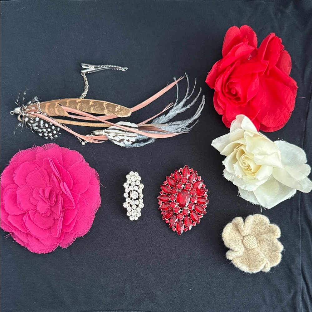 Assorted Floral and metal brooches and 1 feathered Hair Clip